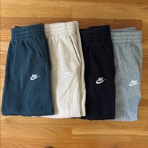 EUC lot of 4 pairs of Nike boys sweatpants size large